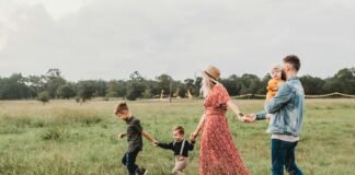 The Ties That Truly Bind: How Intentional Family Time Builds Unbreakable Bonds in a Distracted World woman holding man and toddler hands during daytime