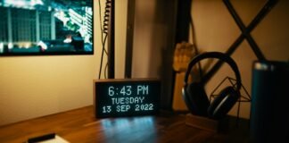 Rise with Purpose: Crafting a Morning Routine That Transforms Your Day (and Life) a digital clock on a desk