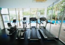 The Core of Strength: 5 Essential Exercises to Build Stability, Power, and Endurance black treadmills and elliptical trainers in glass room