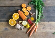 Flavor Without Guilt: 10 Healthy, Low-Calorie Snacks You’ll Actually Crave sliced orange fruit and green leaves on brown wooden table