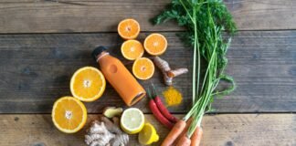 Flavor Without Guilt: 10 Healthy, Low-Calorie Snacks You’ll Actually Crave sliced orange fruit and green leaves on brown wooden table