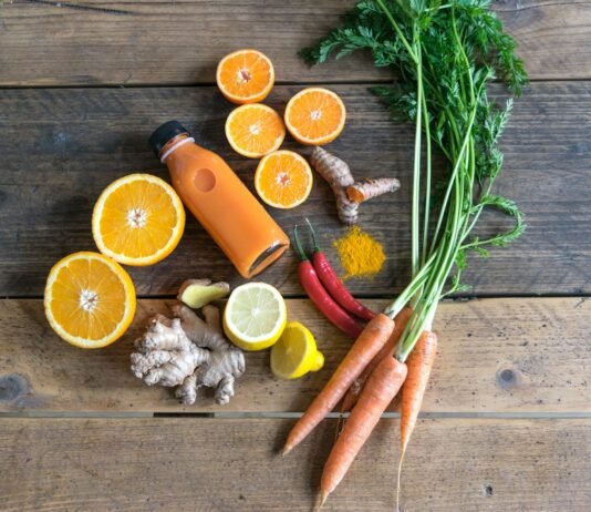 Flavor Without Guilt: 10 Healthy, Low-Calorie Snacks You’ll Actually Crave sliced orange fruit and green leaves on brown wooden table