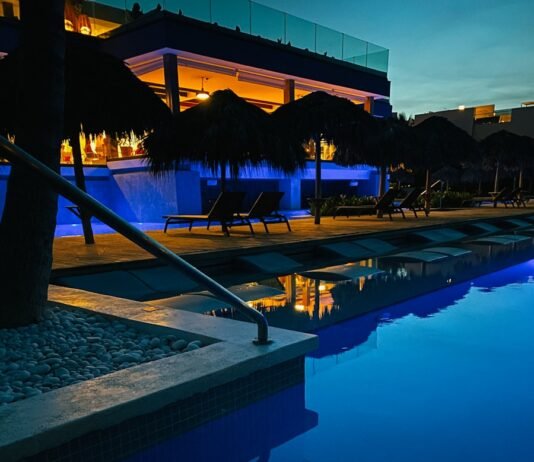The Evening Blueprint: Habits That Build Restful Nights and Better Tomorrows swimming pool near trees during night time