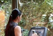Stronger, Safer, Smarter: A Holistic Guide to Preventing Exercise Injuries a woman using a weight machine