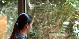 Stronger, Safer, Smarter: A Holistic Guide to Preventing Exercise Injuries a woman using a weight machine