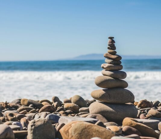 Coping with Anxiety: 5 Practical Tips for Finding Calm and Control stack rock on seashore