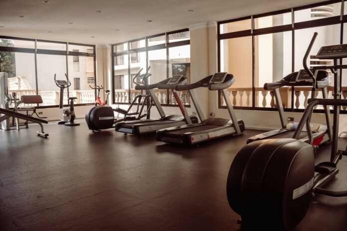 a gym with treadmills and exercise machines