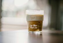 Clear and Simple: Why Daily Hydration Might Be the Health Habit You’re Overlooking cup of coffee on wooden surface