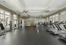 Fit on Your Terms: A Practical Home Workout Plan for Busy People A gym filled with lots of machines and windows