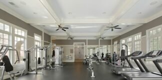 Fit on Your Terms: A Practical Home Workout Plan for Busy People A gym filled with lots of machines and windows