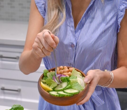 Nature’s Powerhouse: 10 Superfoods That Deserve a Spot on Your Plate person holding green vegetable on brown ceramic plate