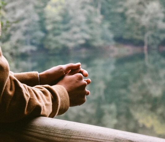 Emotional Spring Cleaning: Releasing Negativity to Reclaim a Fulfilling Life tilt-shift photography of person in brown jacket
